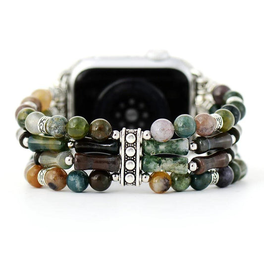 Colorful beaded watch band with intricate metal accents.