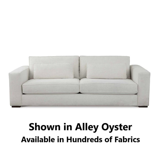 Beige sofa in 'Alley Oyster'; available in many fabrics.