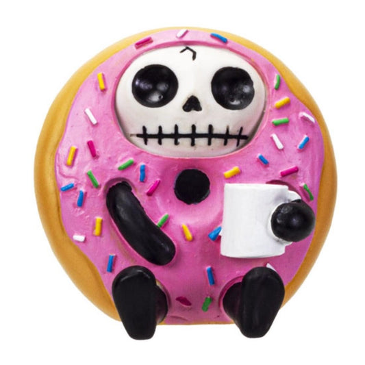 Cute skeleton donut figure with pink icing and colorful sprinkles holding a white mug.
