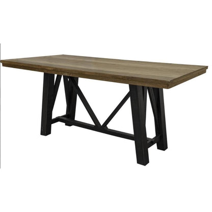 A wooden table with a trestle black metal base.
