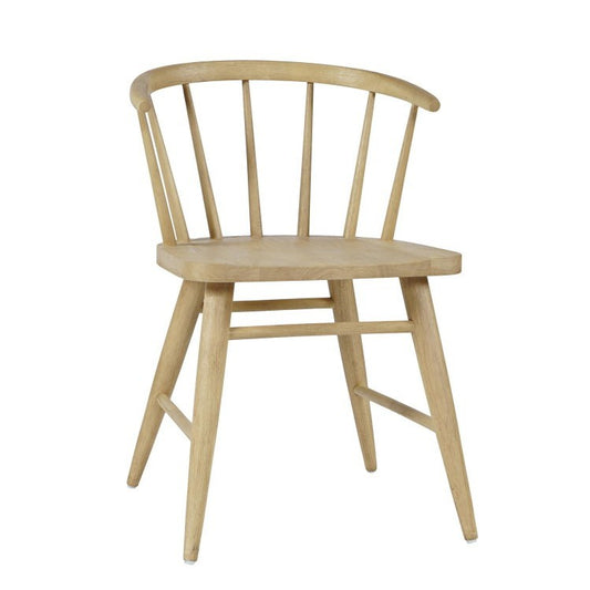 Wooden spindle-back chair with a round seat and angled legs.