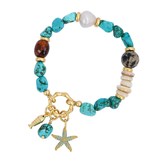 Turquoise beaded bracelet with sea-themed charms.