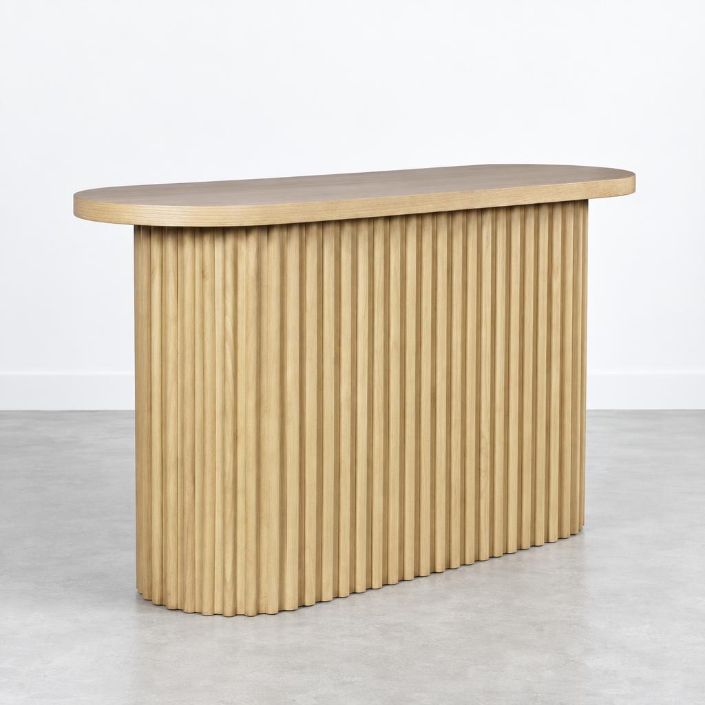 Wooden table with vertical slats and an oval top.