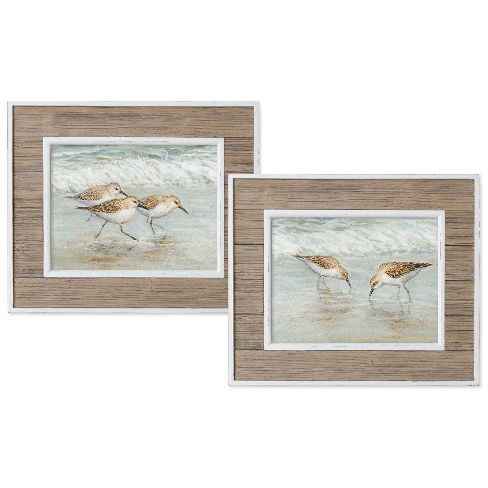 Framed artwork of shorebirds at the beach, set against wooden backgrounds.