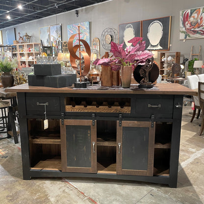 Rustic cabinet with decor items and art displayed in a shop setting.