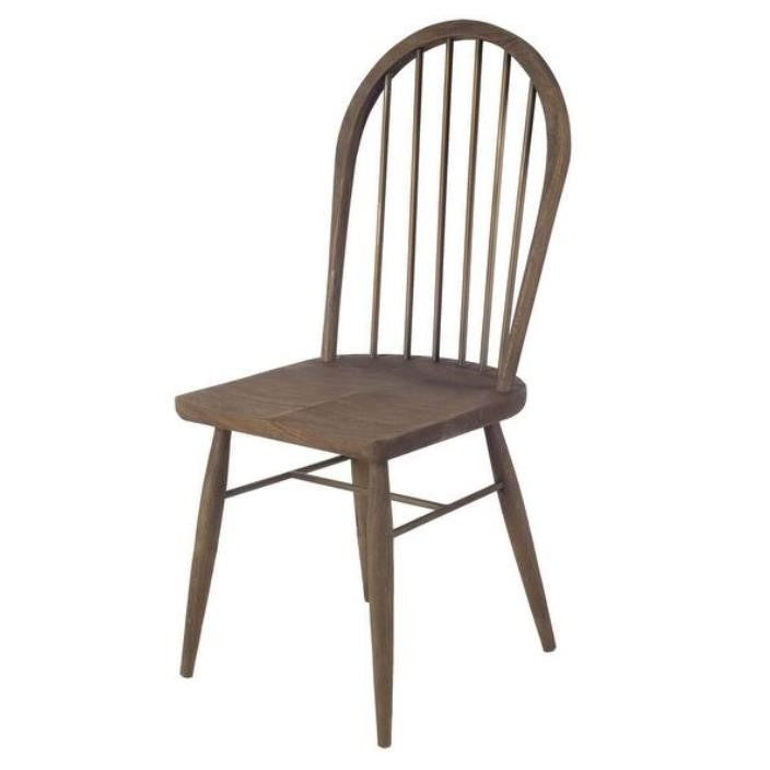 Wooden chair with a spindle back and angled legs.