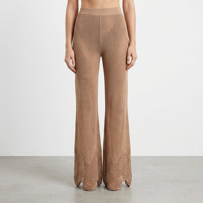 Brown knit pants with intricate pattern at flared hems.