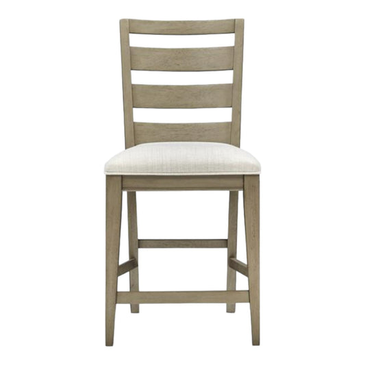 Wooden chair with ladder back and cushioned seat.