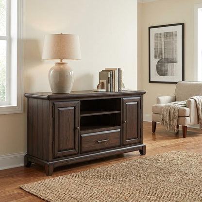 Cozy living room with a dark wood console and beige armchair.