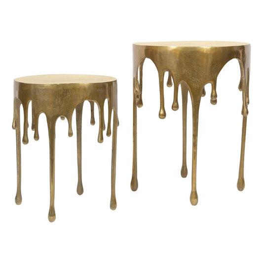 Two bronze tables with artistic, dripping designs.