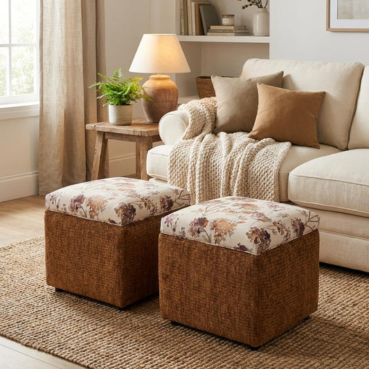 Cozy living room with a beige sofa and patterned ottomans.