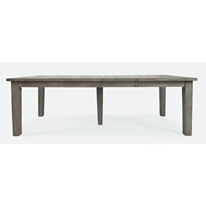 Gray wooden dining table against a white background.