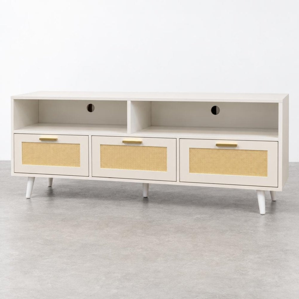 A white mid-century TV console with cane-front drawers and open shelves.