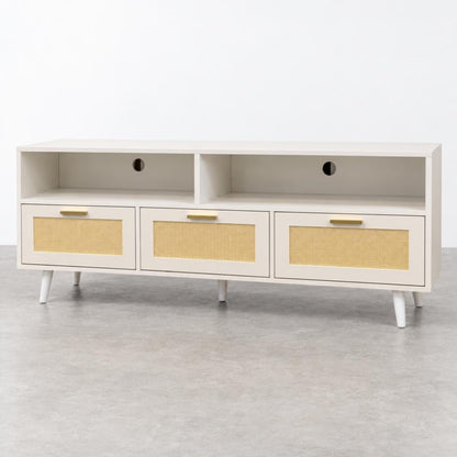 A white mid-century TV console with cane-front drawers and open shelves.