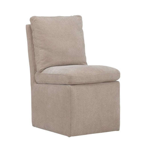 Beige cushioned armless chair with a minimalist design.