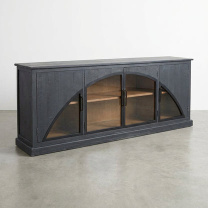 Dark wooden cabinet with arched glass doors and simple handles.