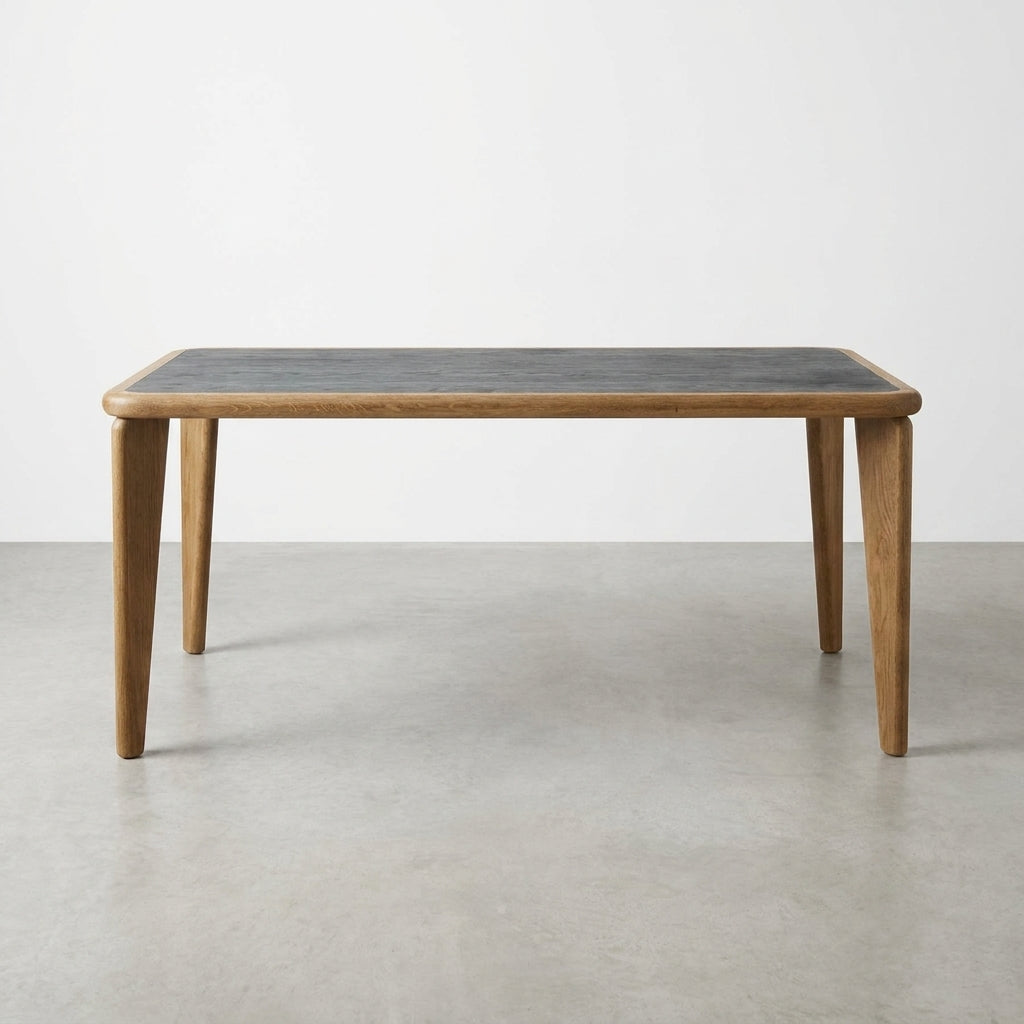 Wooden table with tapered legs and a dark tabletop.