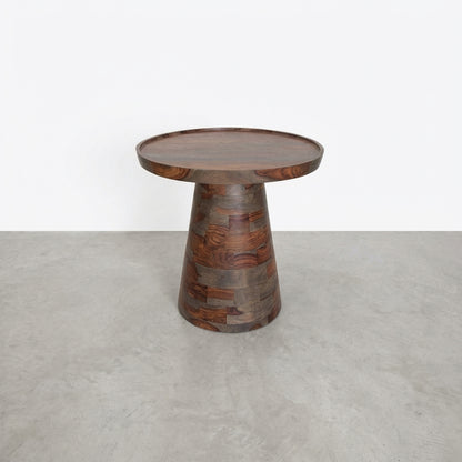 Wooden round table with a tapered base.