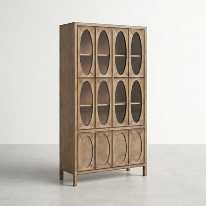 Wooden cabinet with oval pattern doors, standing on a light gray floor.