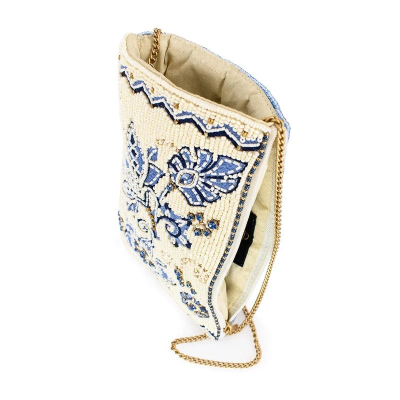 Beaded pouch with floral design and gold chain strap.