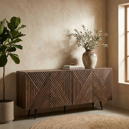 Wooden sideboard with geometric patterns on black legs.