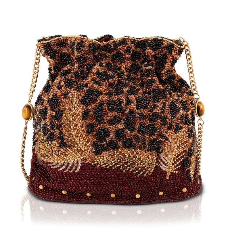 Beaded bag with leopard pattern and gold chain strap.