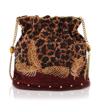 Beaded bag with leopard pattern and gold chain strap.