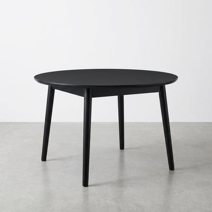 Round black table with four legs.