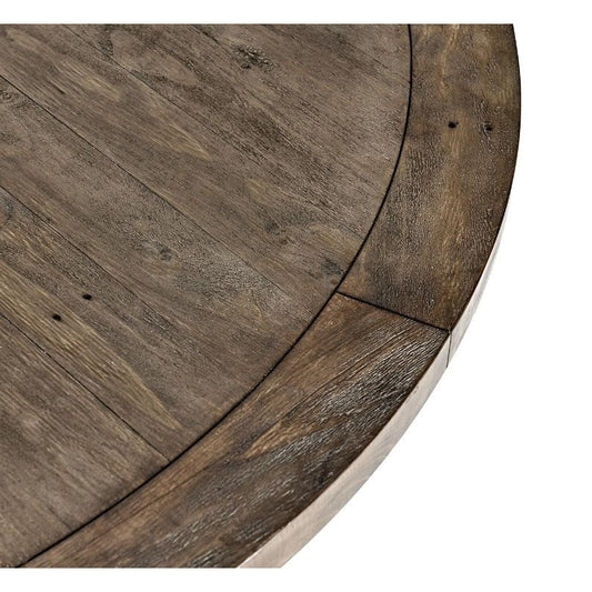 Round wooden table with natural grain details.