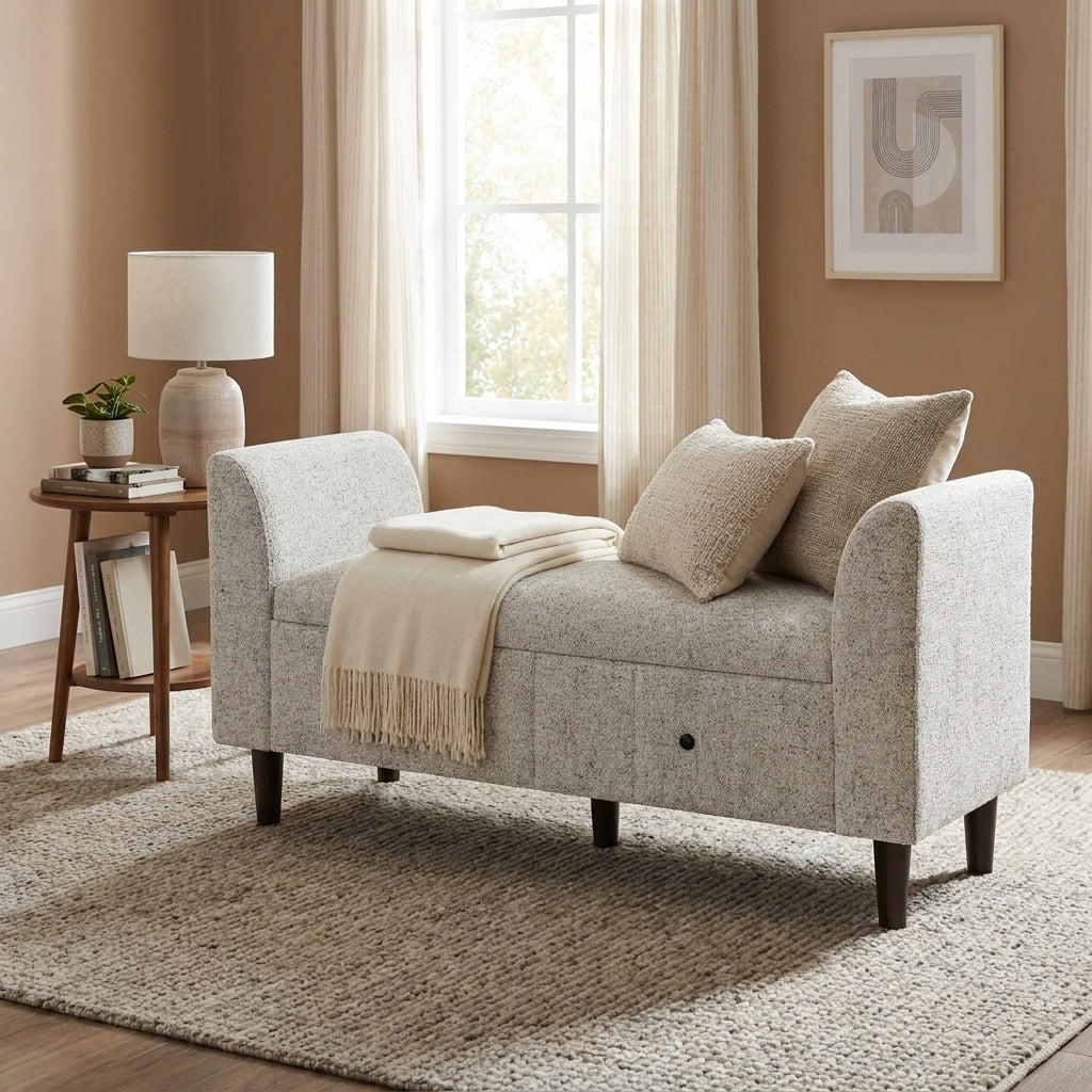Gray upholstered bench with storage and dark wooden legs.