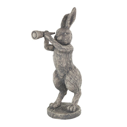 Rabbit statue looking through a telescope.