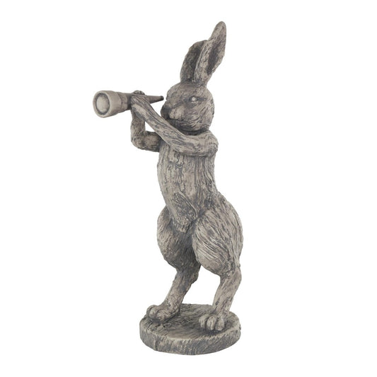 Rabbit statue looking through a telescope.