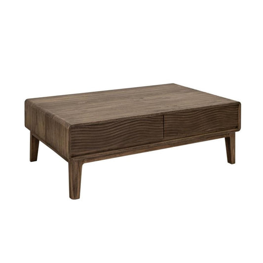 Wooden coffee table with wavy textured drawer front.