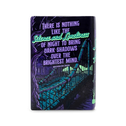 Night scene with eerie quote about silence and loneliness, featuring a bridge and trees.