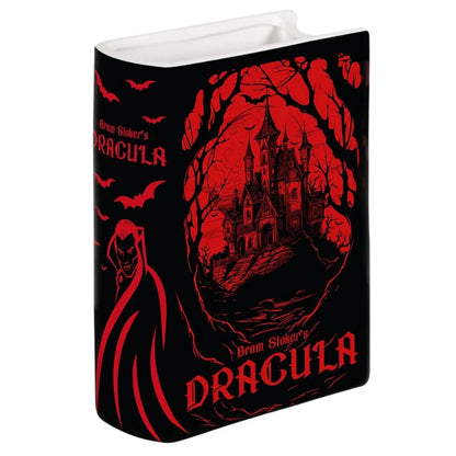 Black book cover with red illustrations of Dracula and a gothic castle.