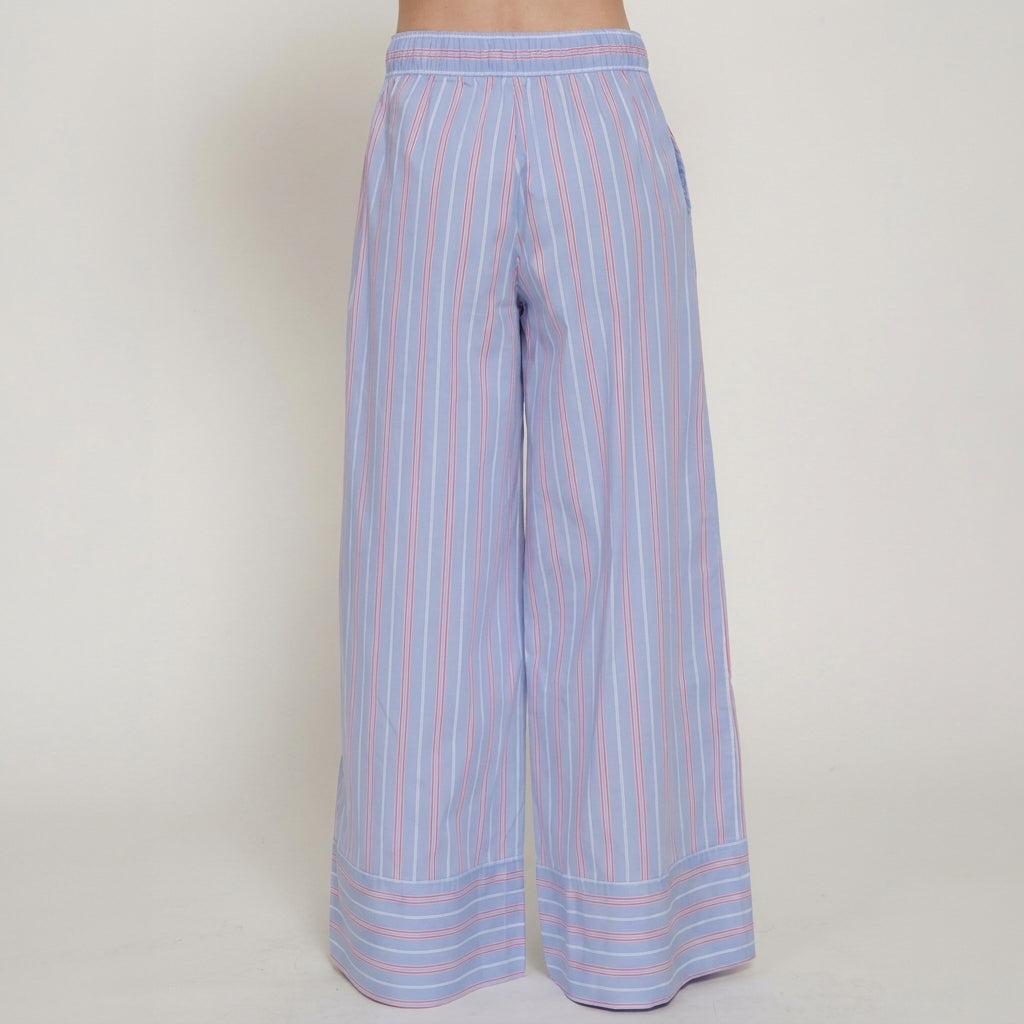 Striped wide-leg pants in pastel blue and pink against a plain background.