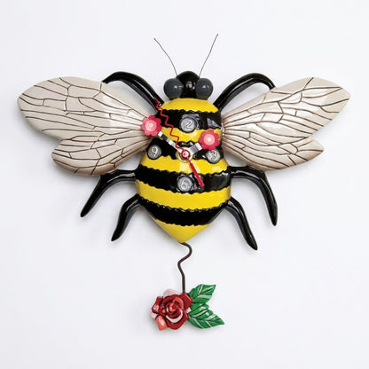 Bee-themed clock with wings and a flower pendulum.