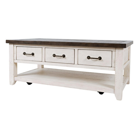 White wooden table with three drawers and a dark top.