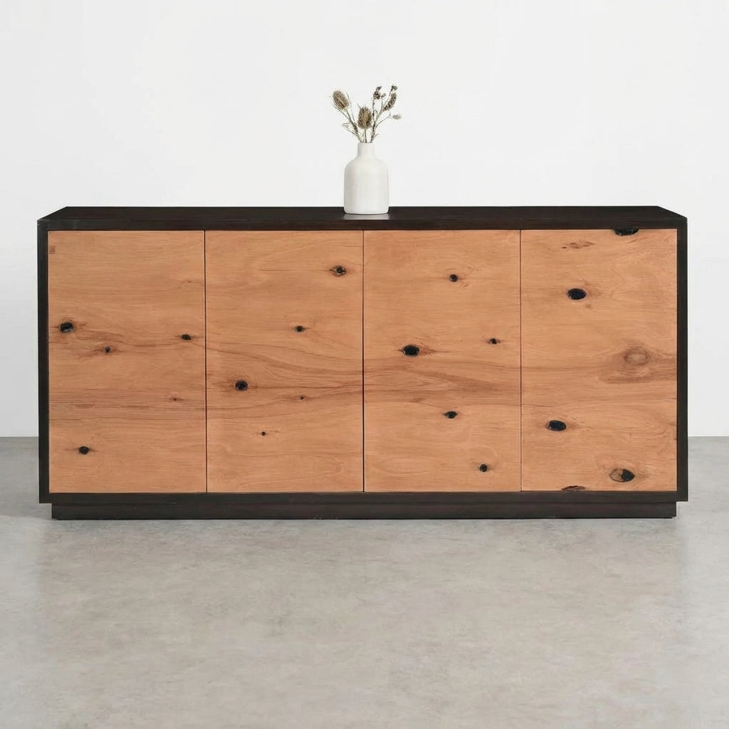 Wooden sideboard with natural knots and dark edges.