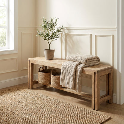 Wooden bench with simple, rustic design.