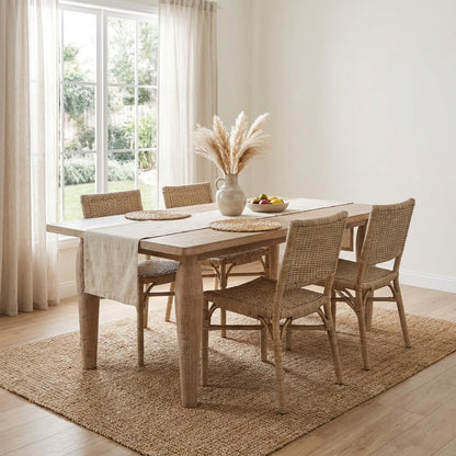 Simple wooden table with smooth surface and tapered legs.