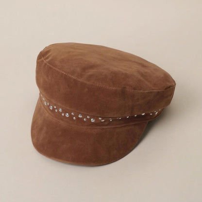 Brown suede cap with rhinestone accents.