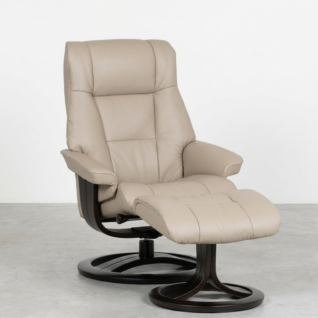 Beige recliner chair with matching ottoman, dark wooden base.