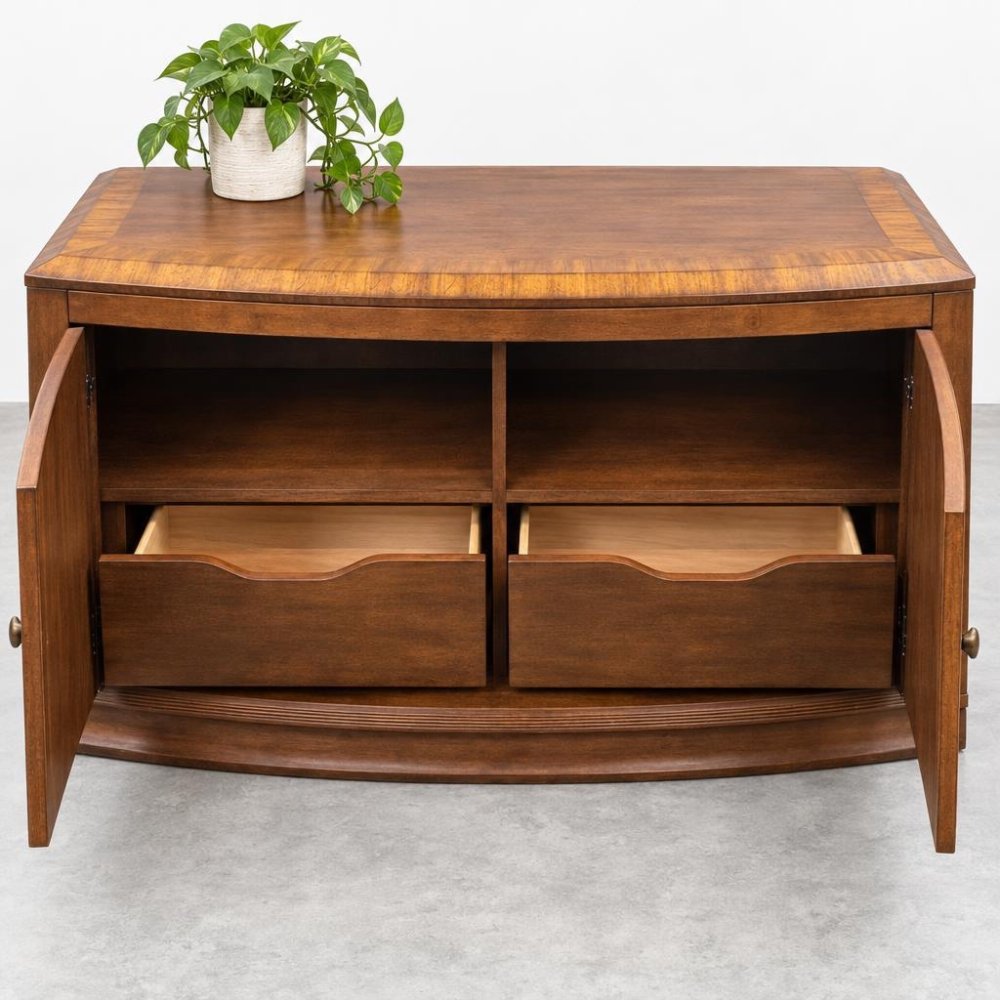 Wooden cabinet with open doors, drawers, and a potted plant on top.