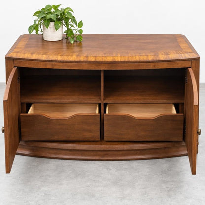 Wooden cabinet with open doors, drawers, and a potted plant on top.