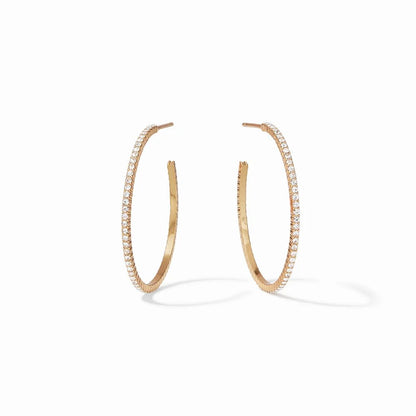 A pair of gold hoop earrings adorned with sparkling stones.