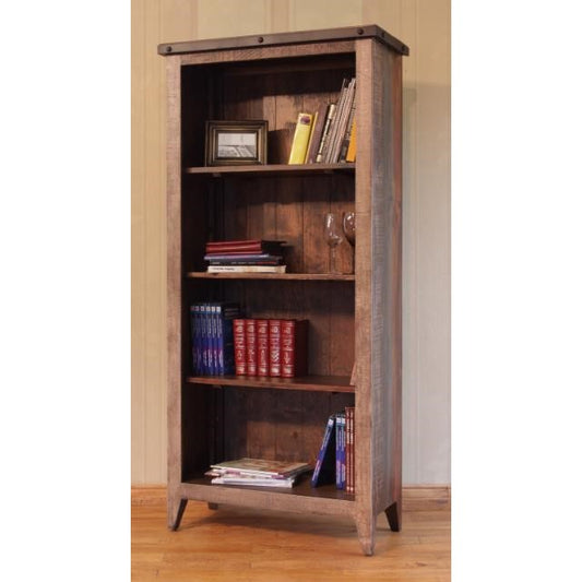 Wooden bookshelf with books, picture frame, and wine glasses.
