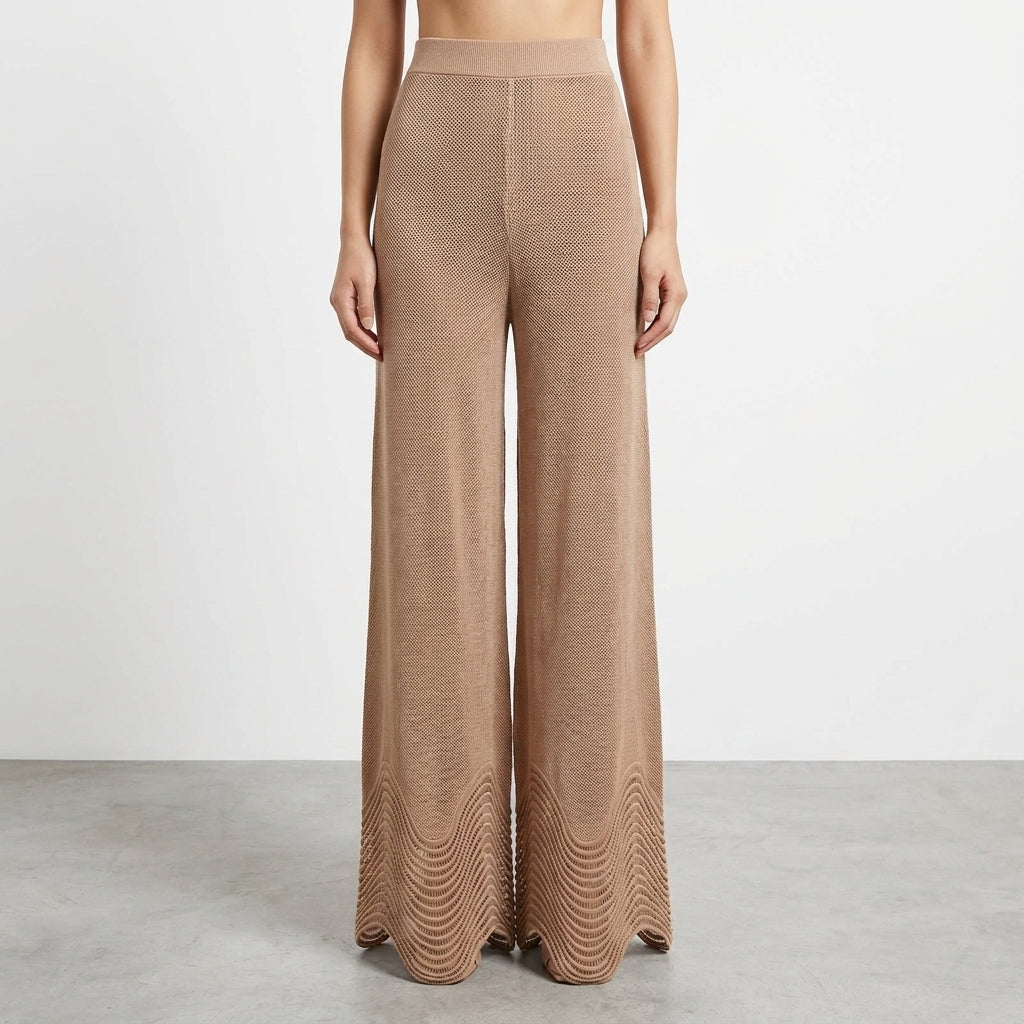 Tan wide-leg knit pants with a wavy pattern at the hem.