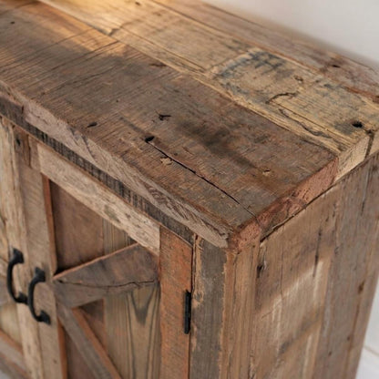 Rustic wooden cabinet with metal handles.