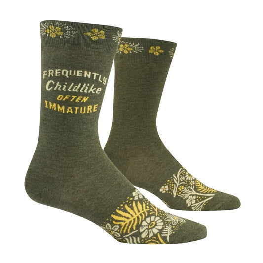 Green socks with text: "Frequently Childlike Often Immature," and floral patterns.